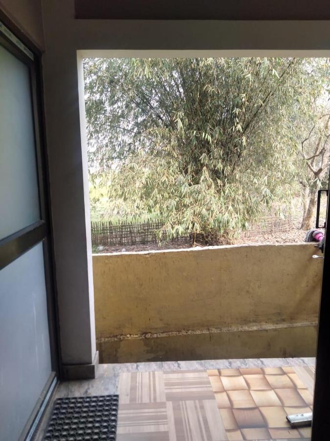 גווהטי Woodland Lodge And Restaurant מראה חיצוני תמונה