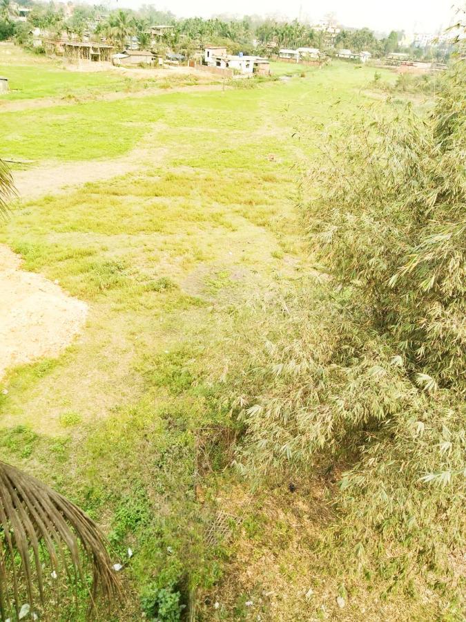 גווהטי Woodland Lodge And Restaurant מראה חיצוני תמונה